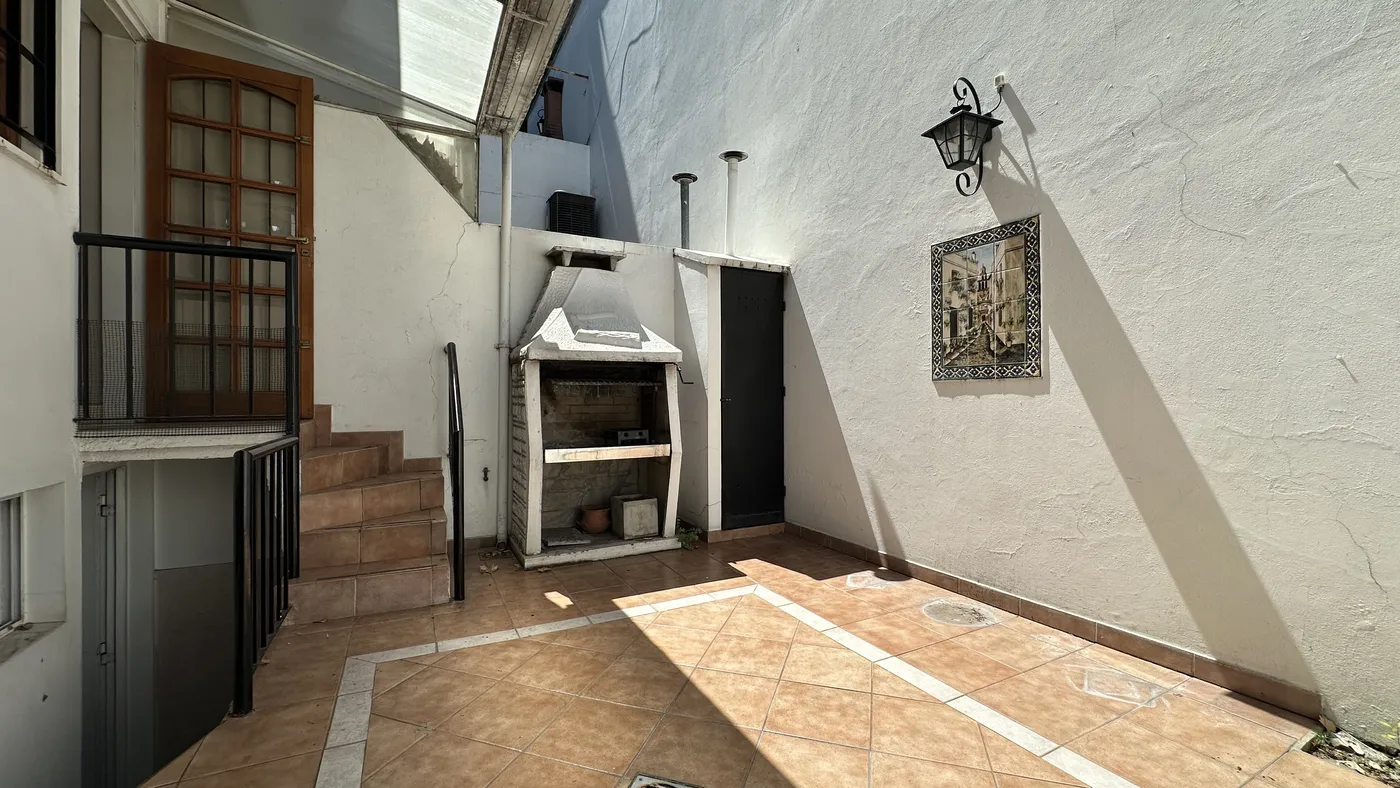 Patio con parrilla propia